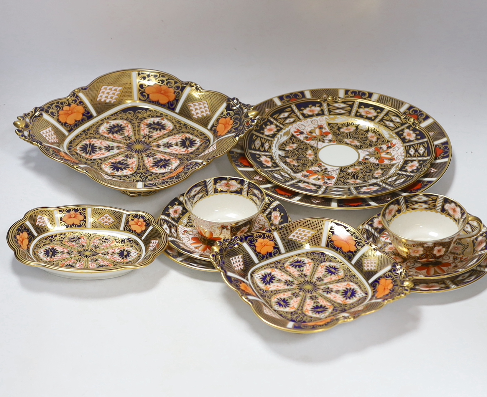 A collection of Royal Crown Derby Imari porcelain, largest 27cm in diameter